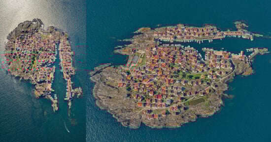 Aerial view of two rocky islands with dense clusters of red-roofed houses surrounded by deep blue water; the left island is smaller, while the right island is larger with more buildings and green patches.