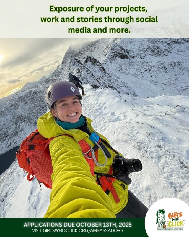 A smiling woman in a helmet and bright jacket takes a selfie on a snowy mountain ridge, carrying a camera and a red backpack. Text promotes Girls Who Click ambassador applications, due October 13th, 2025.