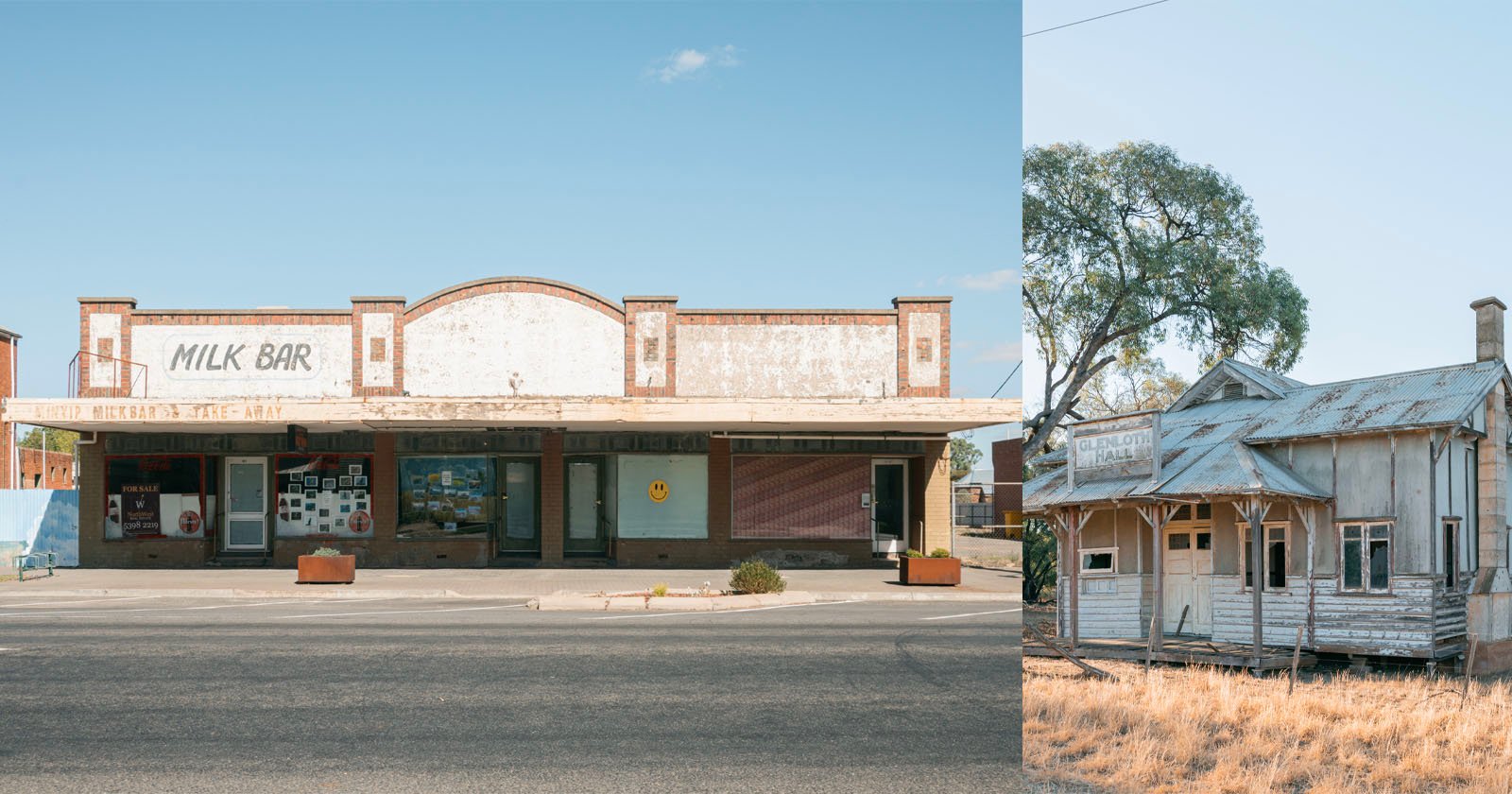 Two old, weathered buildings: on the left, a closed "Milk Bar" with faded signage and boarded windows; on the right, a dilapidated wooden house with peeling paint and broken windows, set among dry grass.