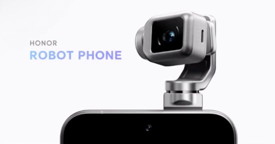 A close-up of a smartphone with a robotic camera module attached on top. The words "Honor Robot Phone" appear on the left side of the image. The background is plain and light-colored.