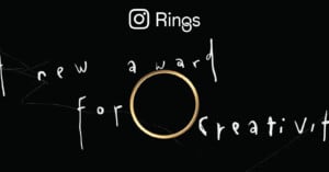 A gold ring is centered on a black background with white handwritten text reading "A new award for creativity," and an Instagram logo above the word "Rings.