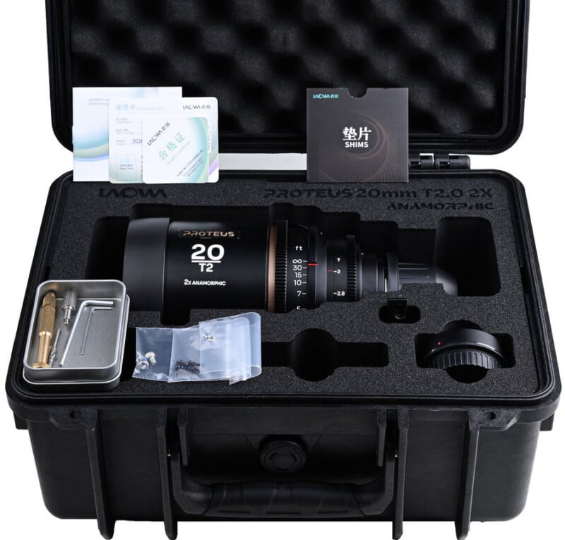 A Laowa Proteus 20mm T2.0 2X anamorphic lens set inside a protective carrying case with foam inserts, accompanied by accessories, shim instructions, and adjustment tools arranged neatly.
