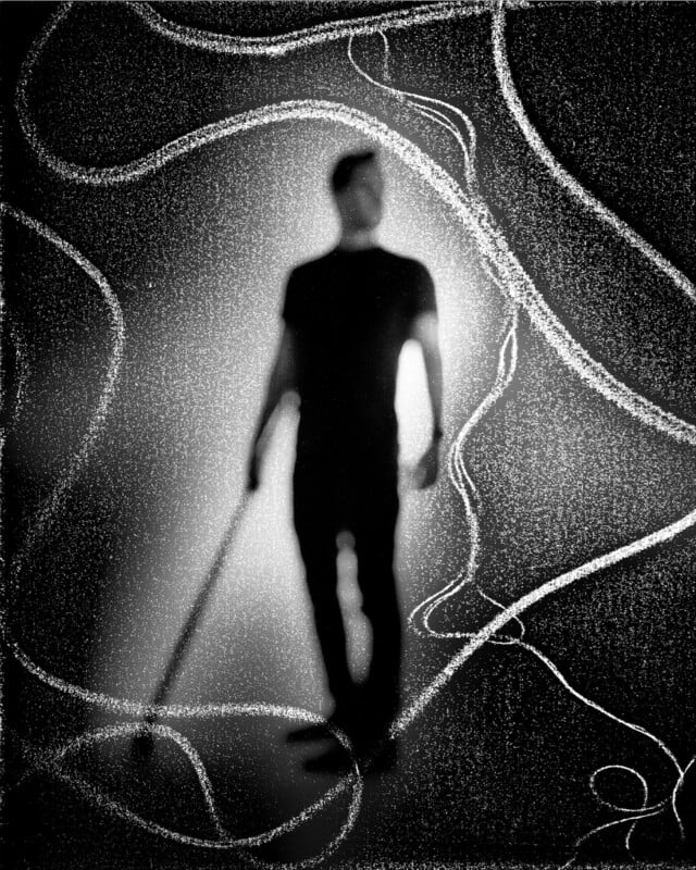 A blurry black-and-white image of a person standing with a cane; white, wavy lines surround the figure, creating a sense of movement and texture. The background is textured and dark.
