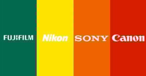 Four vertical color stripes with camera brand names: Fujifilm on green, Nikon on yellow, Sony on orange, and Canon on red, each in their distinctive logo fonts.