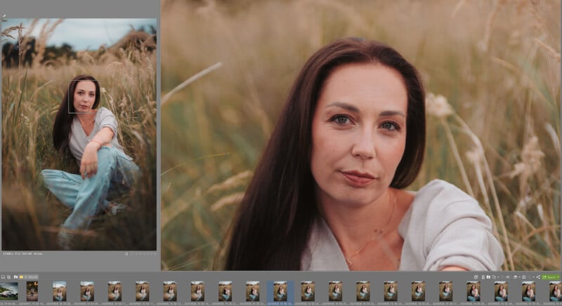 A woman with long dark hair sits in tall grass, wearing a light-colored top and jeans. She looks calmly at the camera. The photo editing software shows her portrait with thumbnails of similar images below.