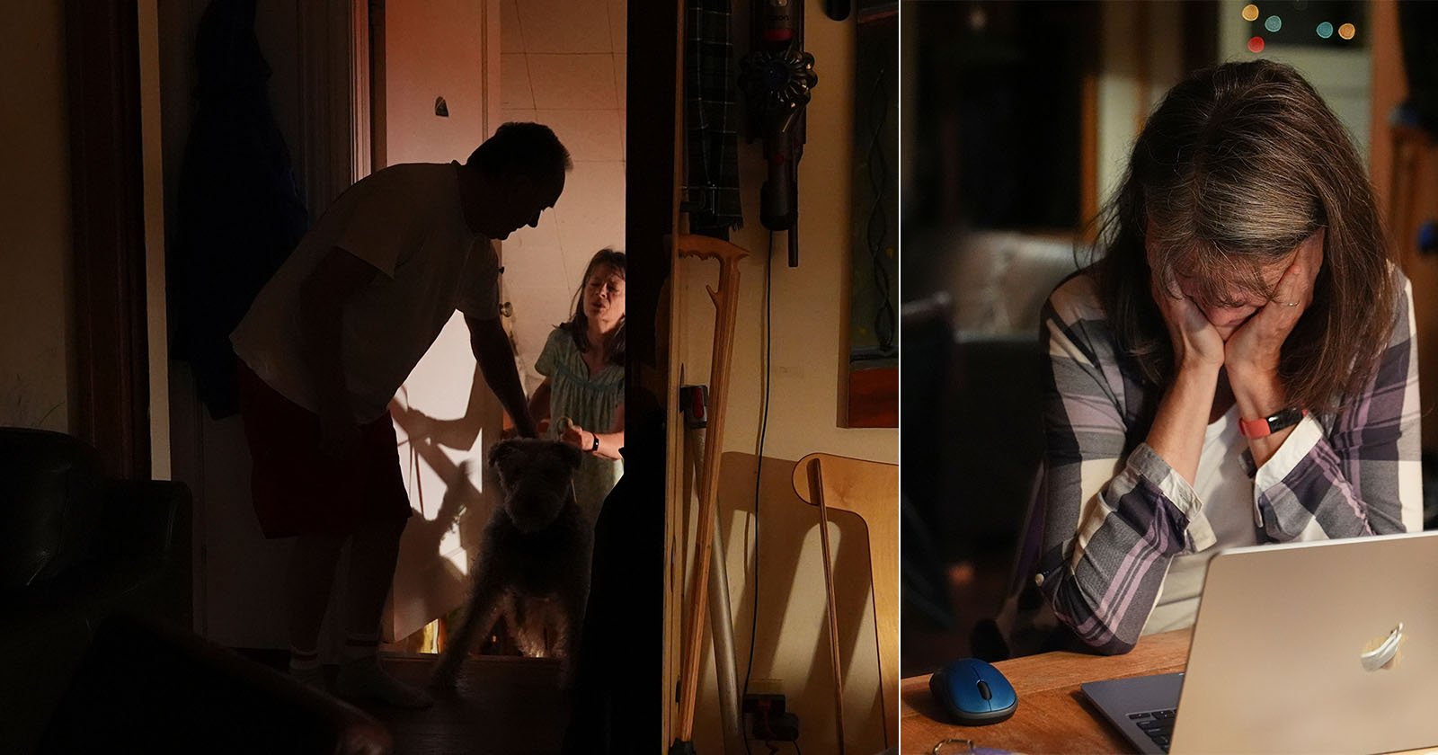 A dimly lit home scene split in two: on the left, a man and a woman greet a dog at the door; on the right, the woman sits at a table, looking down with her head in her hand beside an open laptop.