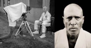A photographer uses a large-format camera covered in a cloth to take a portrait of a serious man in a martial arts uniform sitting outdoors; the resulting close-up black-and-white portrait is shown beside the scene.
