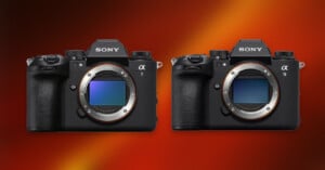Two Sony mirrorless cameras, the Alpha 1 (left) and Alpha 9 (right), displayed side by side against a red and orange gradient background. Both cameras are shown without lenses, revealing their sensors.