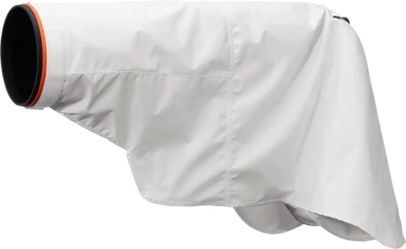 A white, waterproof dog coat with an orange and black collar, shown on a plain background; the coat has a smooth, fitted design and covers the dog's body for protection against cold or rain.