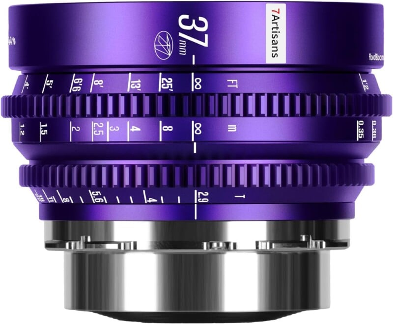 A close-up of a 7Artisans 37mm camera lens with a metallic purple finish, showing detailed focus and aperture markings on its rings. The lens is positioned horizontally against a white background.