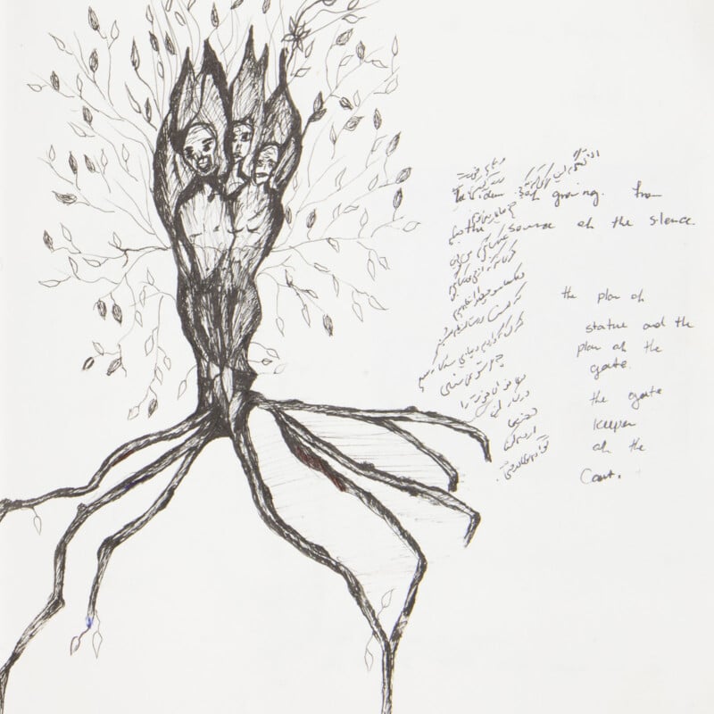 Black ink drawing of two human faces emerging from a tree trunk, with branches and leaves above and roots below. Handwritten text, partially legible, appears on the right side of the image in English and another language.