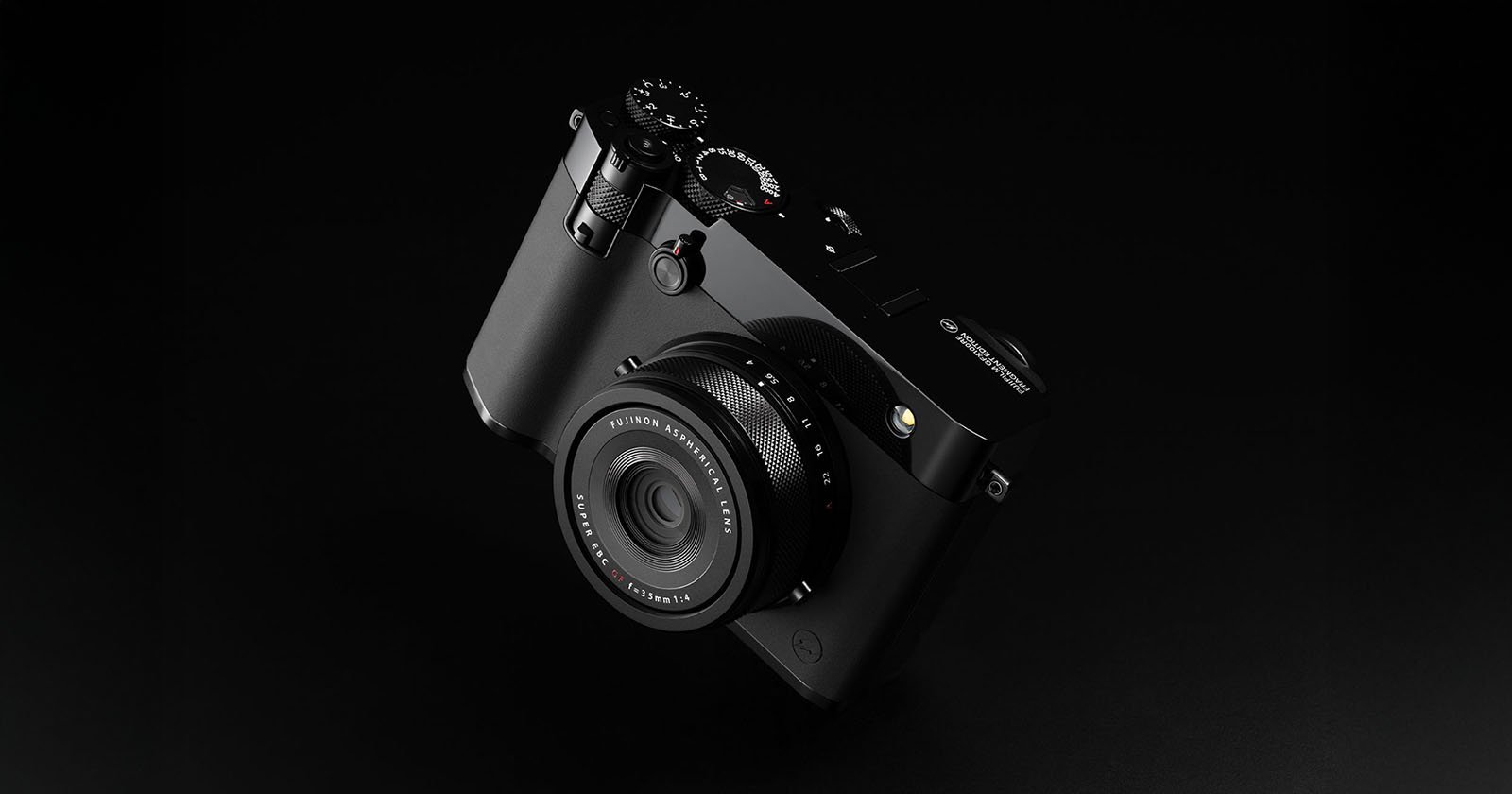 A sleek, black digital camera with a lens and various control dials is displayed on a dark background, showcasing its modern and minimalist design.