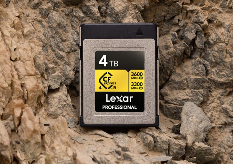 A Lexar Professional CFexpress memory card with 4TB capacity is placed against a rocky background. The card displays read and write speeds of 3600 MB/s and 3300 MB/s, respectively.