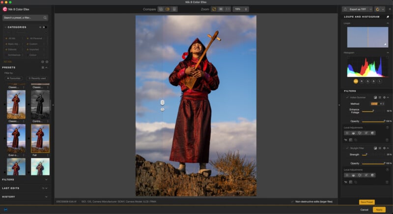 A person in a red robe stands on rocky ground under a blue sky, holding a stringed instrument. Editing software is open, displaying filters, presets, and image adjustments on the screen.