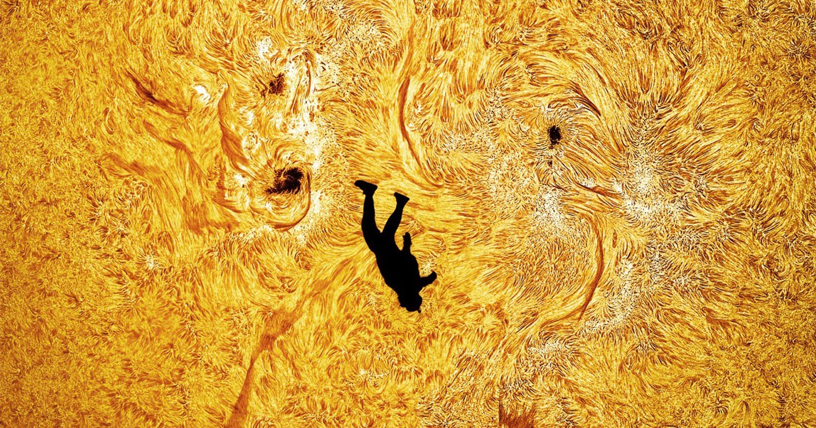 A silhouette of a person appears to fall or float against a vibrant, swirling yellow and orange background resembling the surface of the sun.