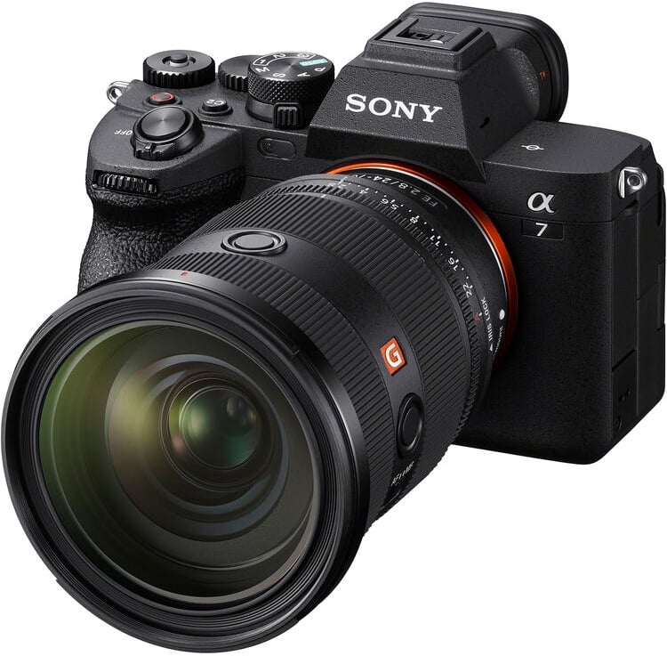 A black Sony Alpha 7 mirrorless digital camera with a large G Master lens attached, angled to show its controls and lens details.