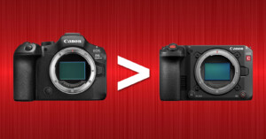 Two Canon cameras side by side on a red background, with a greater-than symbol between them. The camera on the left is a Canon EOS R6 Mark II, and the camera on the right is a Canon EOS R5C.