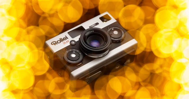 A Rollei 35AF vintage camera is centered on a golden bokeh background, creating a vibrant and nostalgic atmosphere.
