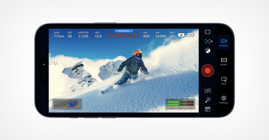 A smartphone screen displays a camera app interface capturing a skier in mid-action on a snowy mountain slope, with camera settings and recording details visible around the image.