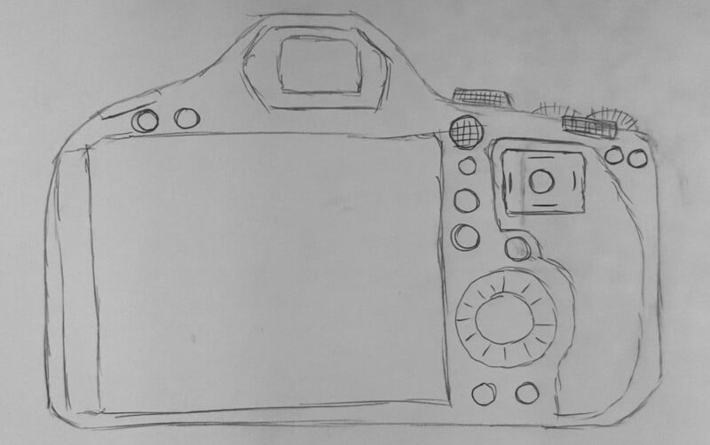 Boceto dibujado a mano de la parte posterior de una cámara digital que muestra el visor, los botones, los diales y la pantalla grande. Las líneas son sencillas, dibujadas sobre papel blanco normal.
