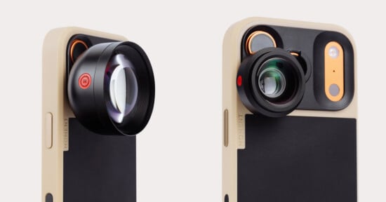 Two smartphones in beige and black cases, each fitted with detachable external camera lenses over the rear cameras, designed to enhance mobile photography.