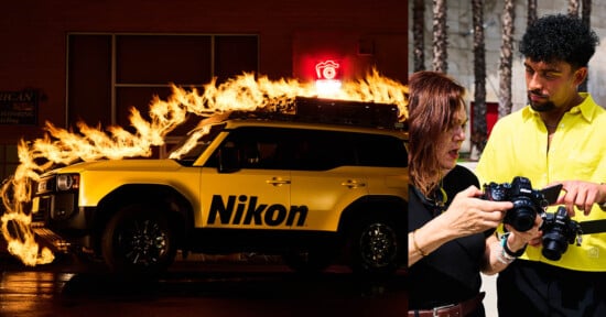 A yellow Nikon-branded SUV with flames on its roof is parked at night. Next to it, a woman and a man in a bright yellow shirt examine a camera together outdoors during the day.