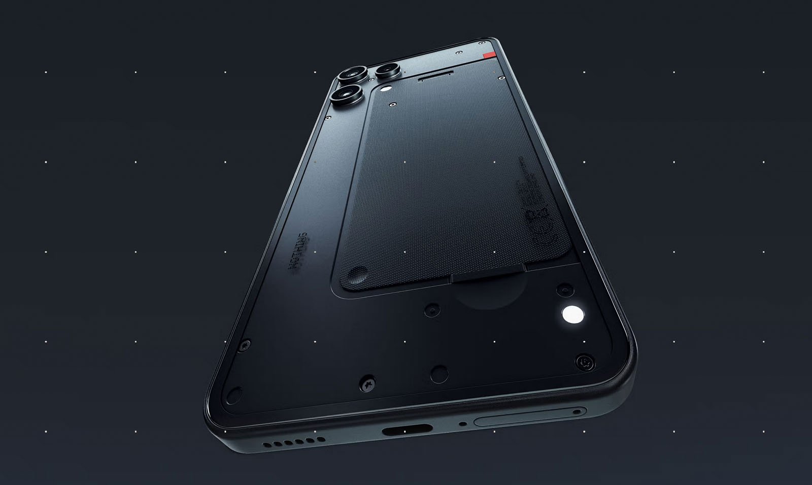 Sleek black smartphone with dual rear cameras and a transparent back panel, revealing internal components, viewed from a low angle against a dark, starry background.
