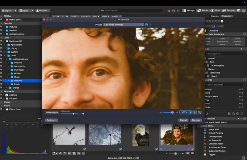 A computer screen displays a photo editing program with a close-up image of a smiling person’s face. Various folders, editing tools, and thumbnail images of nature and people are visible in the background.