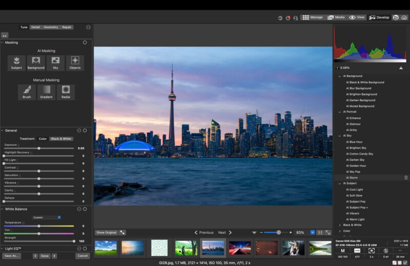 A computer screen displays photo editing software with a cityscape image of Toronto’s skyline at sunset. Editing tools, sliders, and adjustment panels surround the photo, showing real-time histogram and adjustments.