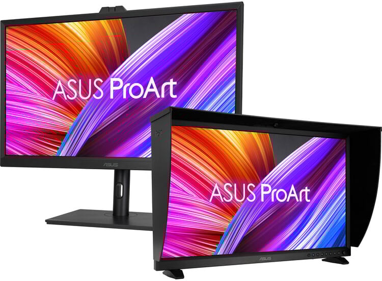 Dos monitores ASUS ProArt mostrados uno al lado del otro, ambos mostrando vibrantes obras de arte abstractas "ASUS ProArt" Texto en la pantalla. Un monitor viene con una capucha.