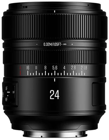 A close-up of a black camera lens with a 24mm focal length, featuring focus and aperture rings, distance markings, and an AF/MF switch on the side.