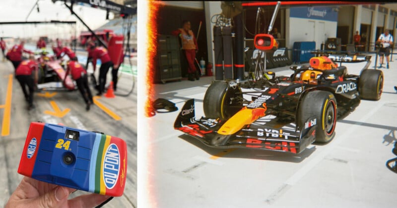 Un hombre sostiene una colorida cámara desechable en primer plano, mientras que al fondo aparece un borroso equipo de boxes de Fórmula 1; a la derecha, un coche Red Bull F1 estacionado en boxes.