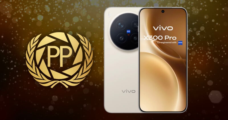 A Vivo X90 Pro smartphone is displayed upright beside a gold PP award emblem with laurel leaves, set against a brown, bokeh-style background.