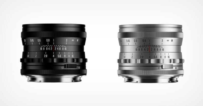 Two camera lenses are shown side by side against a white background; the left lens is black with white and orange markings, and the right lens is silver with black and red markings. Both feature manual focus and aperture rings.