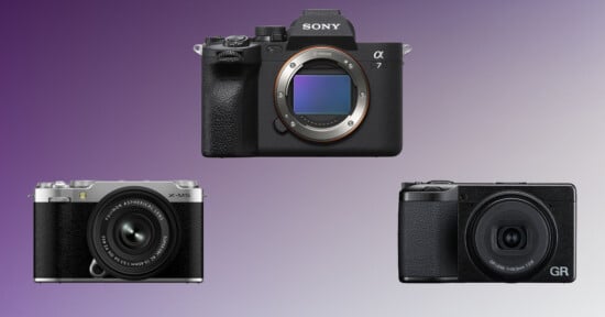 Three digital cameras are shown on a purple gradient background: a Sony Alpha camera (center), a Fujifilm X series camera (bottom left), and a Ricoh GR camera (bottom right).