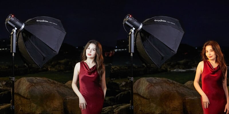 Una mujer con un vestido rojo posa al aire libre frente a una gran roca por la noche, con luces de estudio softbox apuntándola desde ambos lados. El fondo es oscuro con tenues luces de la ciudad.