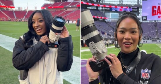 Two women stand on football fields, each smiling and holding a professional camera with a large lens. Both wear media credentials and jackets, with stadium seats and NFL branding visible in the backgrounds.