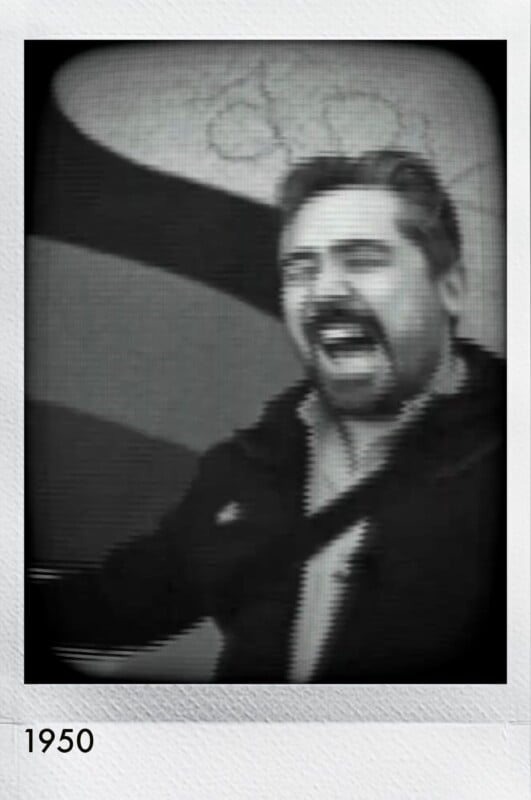 Black and white photo of a man with a beard and mustache, mouth open as if shouting or singing, standing in front of a wall with a map and a striped pattern. The photo has a white border labeled "1950.