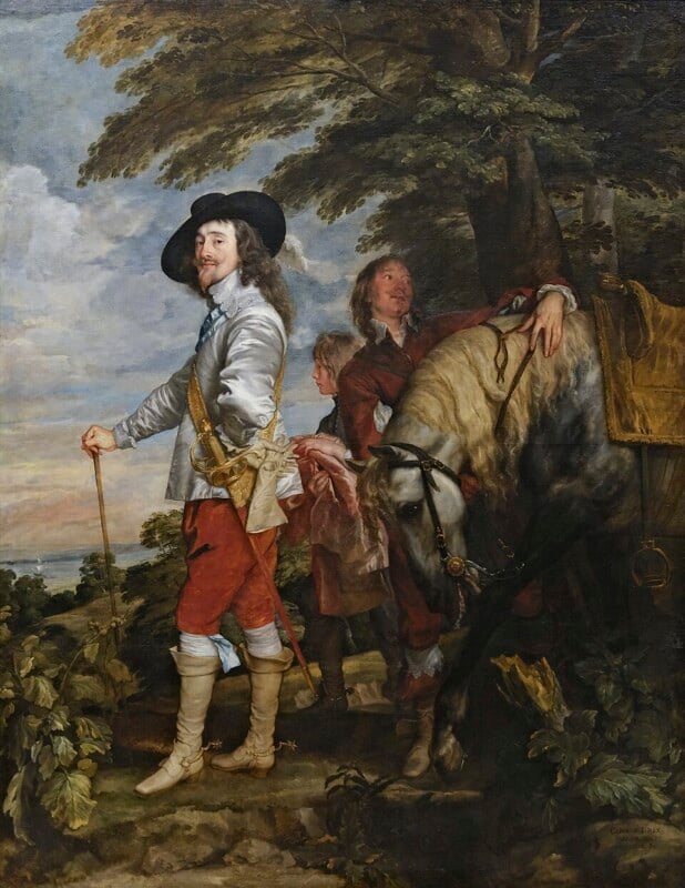 A man in elegant 17th-century clothing stands outdoors holding a walking stick, with two attendants and a saddled horse beside him. Tall trees and a distant landscape fill the background.