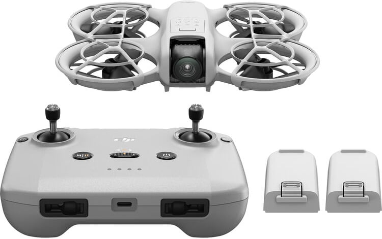A compact, gray drone with a camera is shown above a matching remote controller and two spare batteries, all placed on a white background.