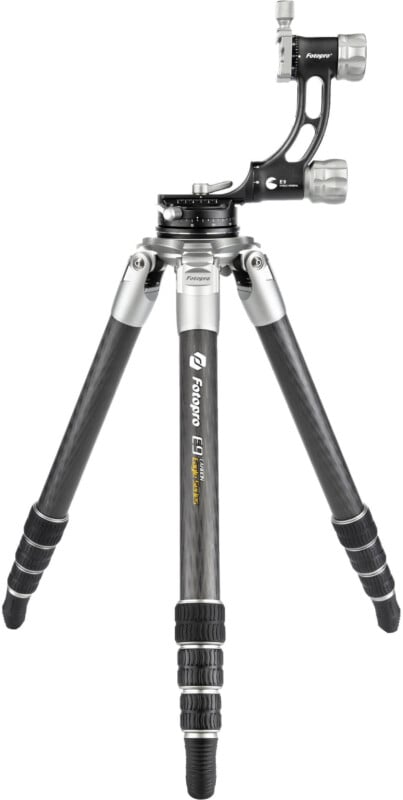 A carbon fiber camera tripod with three extendable legs, twist locks, and an adjustable gimbal head for mounting and stabilizing cameras.