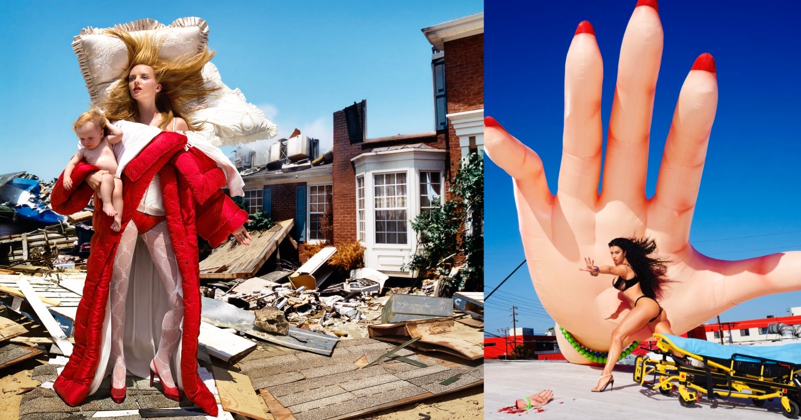 A woman in a red robe holds a baby while standing on debris in front of a damaged house. Nearby, another woman in a black swimsuit poses beside a giant inflatable hand outdoors under a bright blue sky.