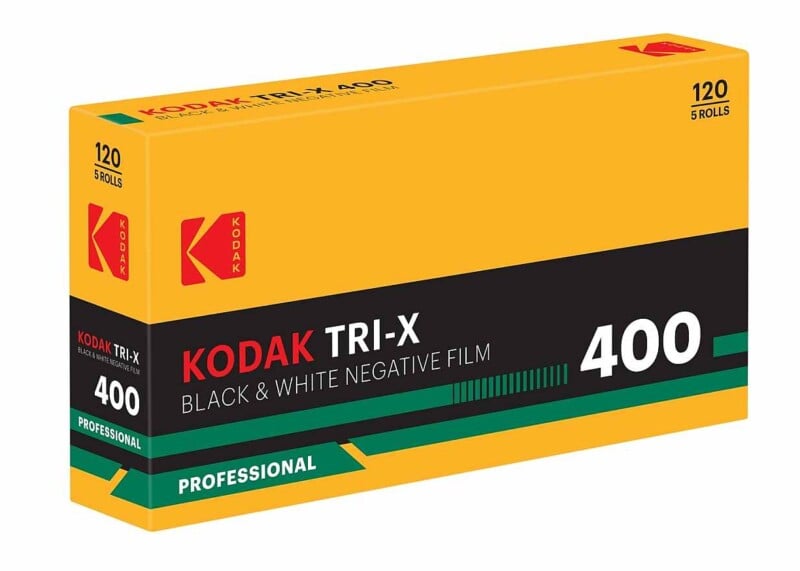 A yellow and black box of Kodak TRI-X 400 professional black and white negative film for 120 rolls, featuring bold white text and green accents.