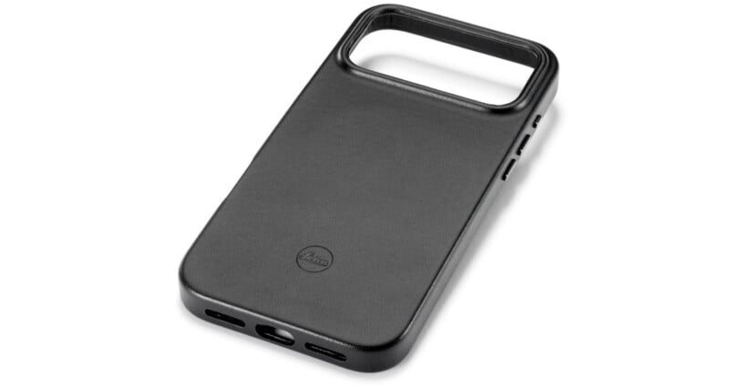 A black, rectangular phone case with a large, open rectangular cutout at the top and an embossed Leica logo near the center. The case has precise cutouts for charging and speaker ports at the bottom.