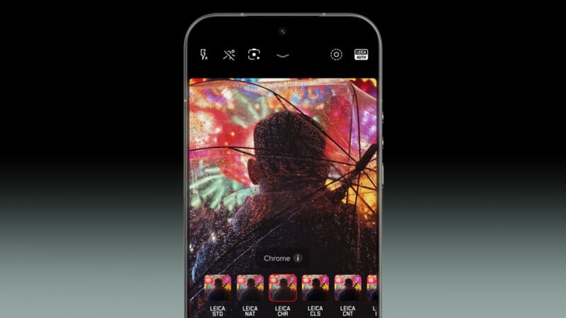 A smartphone screen displaying a photo editing app with a photo of a person holding an umbrella in the rain, colorful city lights in the background, and various filter options shown at the bottom.