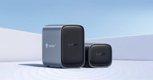 Two sleek, modern network devices labeled “Mercusys MetaBox” and “Gopico” are displayed outdoors against a minimalist white and blue background with soft shadows.