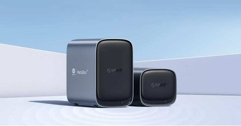 Two sleek, modern network devices labeled “Mercusys MetaBox” and “Gopico” are displayed outdoors against a minimalist white and blue background with soft shadows.