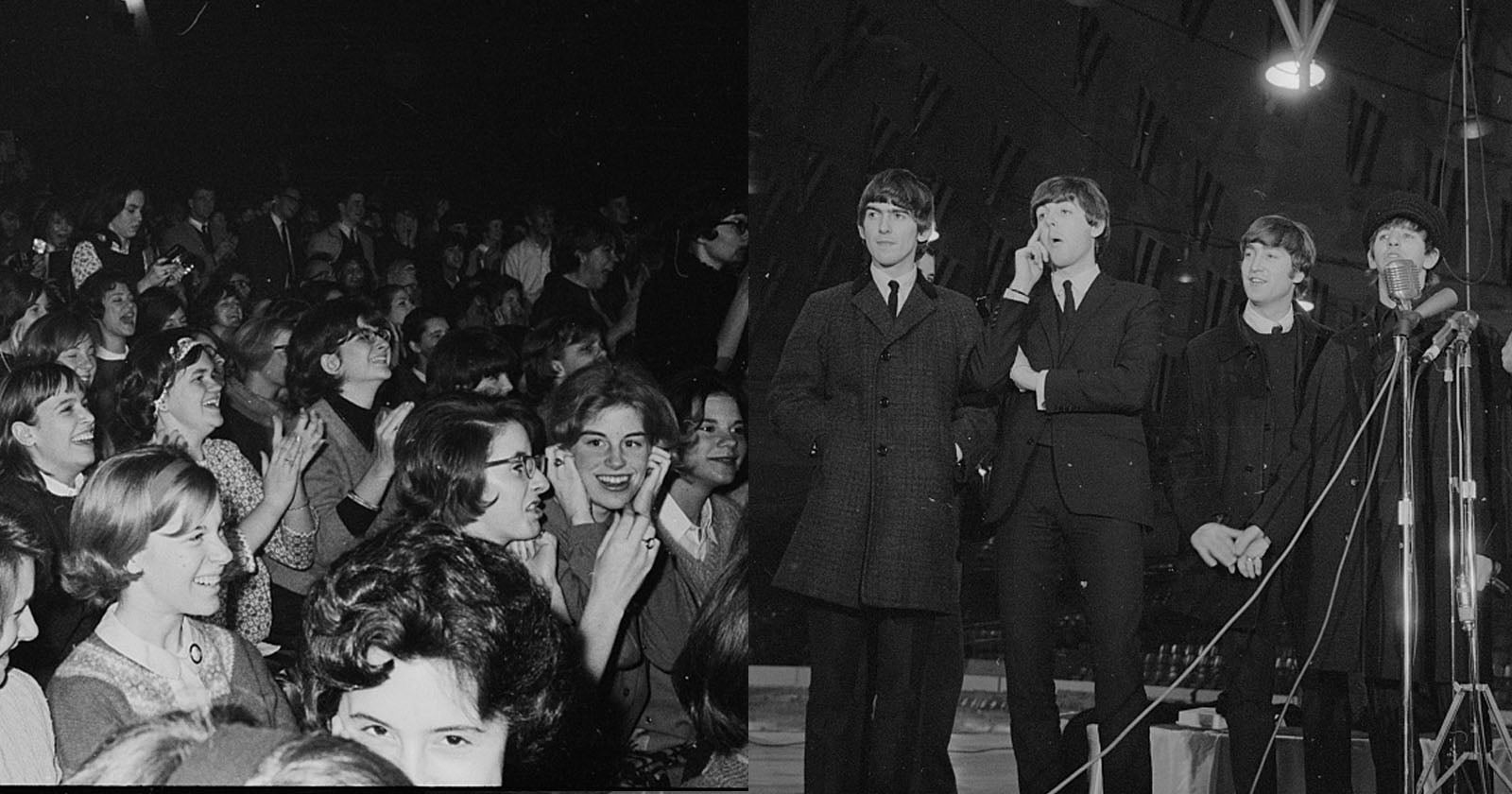 A black-and-white photo shows an enthusiastic audience of young women on the left and three men in suits, likely musicians, standing and speaking into a microphone on stage on the right.
