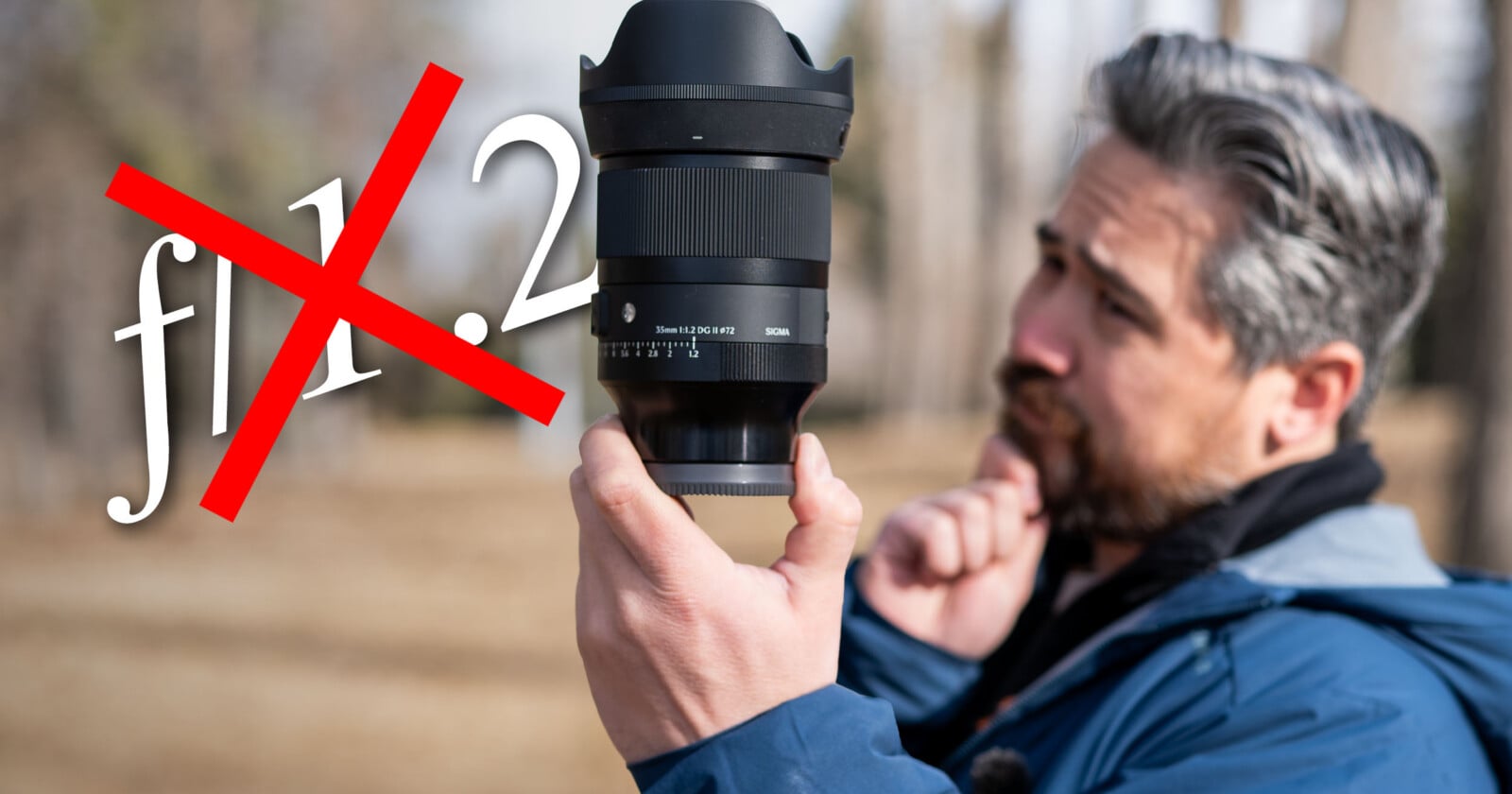 A man in a blue jacket holds up a large camera lens outdoors, examining it thoughtfully. Next to him, the text "f/1.2" is shown with a large red X crossing it out.
