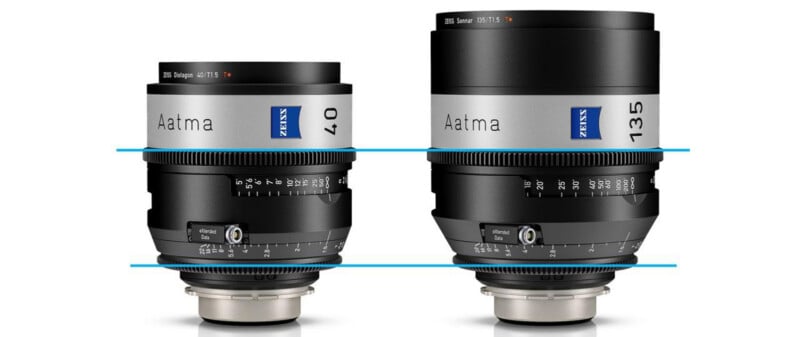 Two Zeiss Aatma camera lenses, one labeled 40mm and the other 135mm, are shown side by side against a white background. Both lenses have a silver and black design with focus and aperture markings.